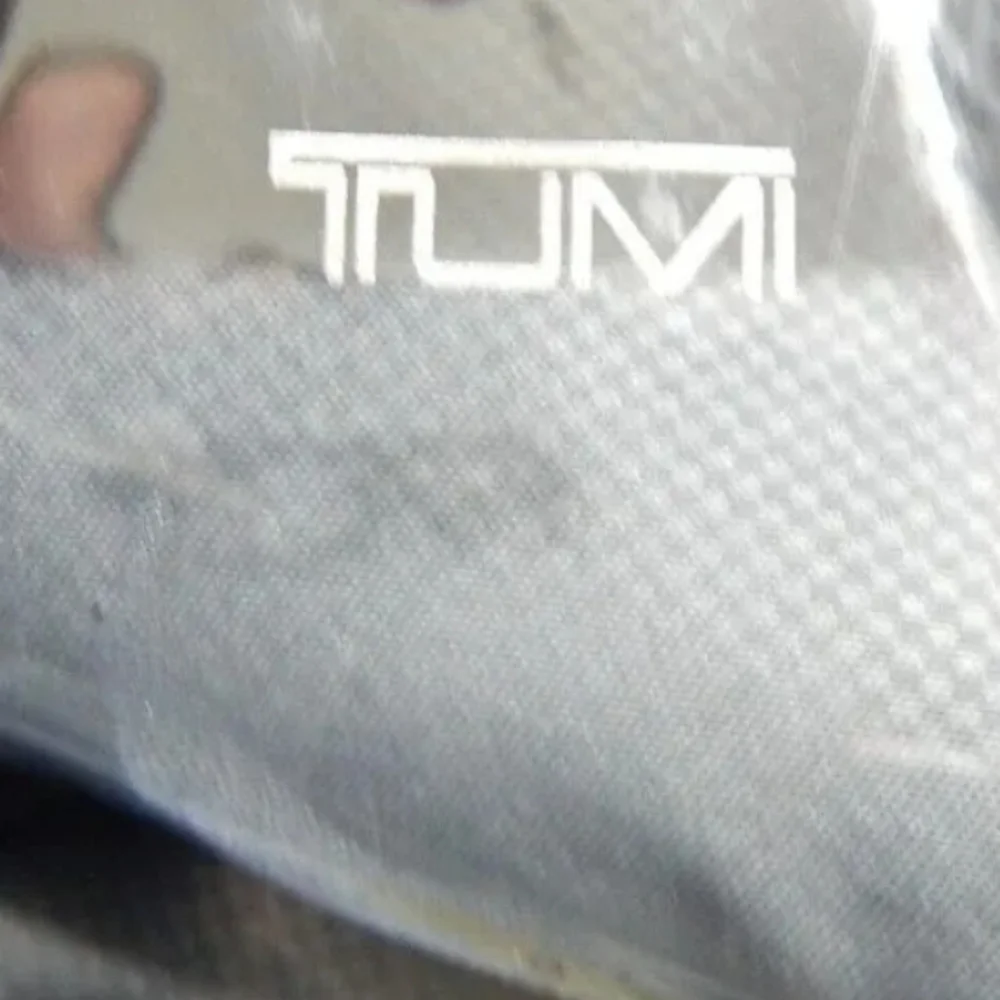 Tumi Blue Zip Around Travel Pouch